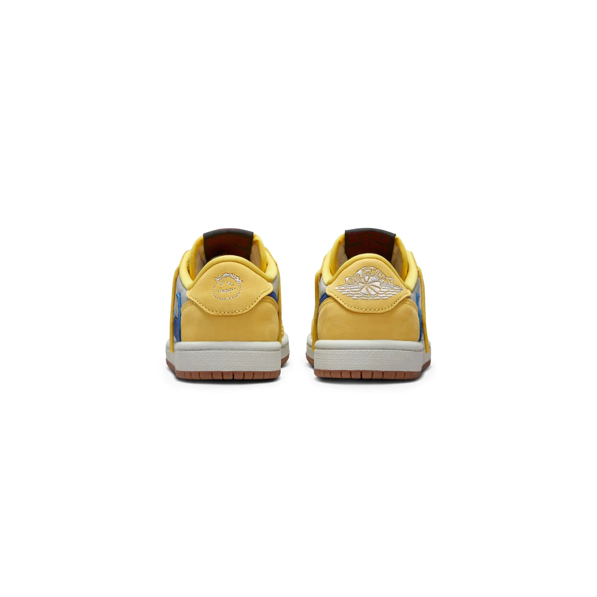 Heel View of travis scott x air jordan 1 low canary ps dz5909-700